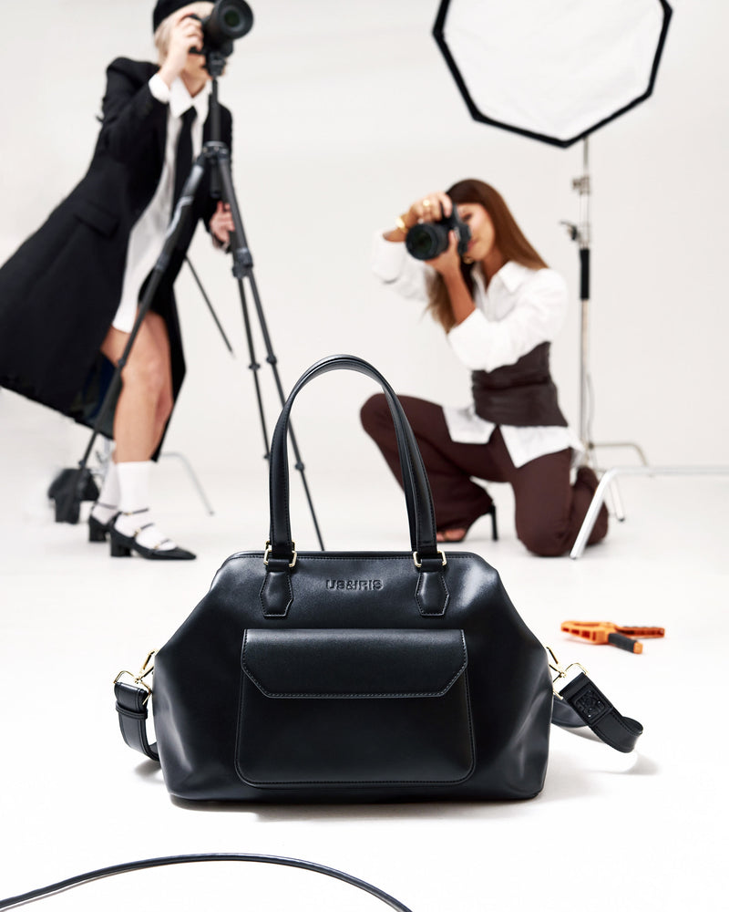 Unisex Noir Mirage vegan leather camera bag in black, a discreet handbag-style crossbody for photographers and filmmakers who want stylish everyday protection.