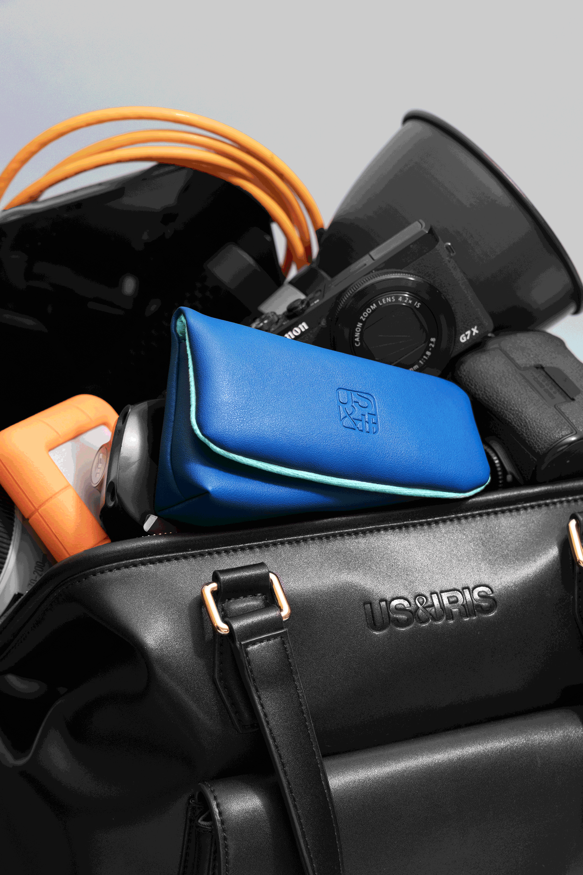 Vegan stylish camera pouch in four bold colours, designed for Canon G7X and compact film cameras, digi cameras. Fashionable camera pouch for content creators, travel photographers, and everyday use.
